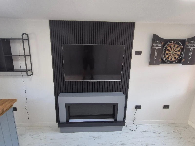 Interior view of the newly converted room featuring a finished floor with Celotex insulation