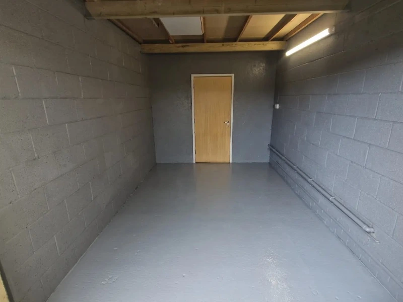 Garage walls and floor painted with crisp, clean paint lines